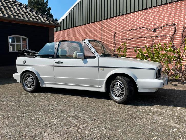 VW Golf 1.8 Cabrio 72kw U9 1993 Parelmoer Wit, Autos, Volkswagen, Particulier, Golf, Intérieur cuir, Jantes en alliage léger, Essence