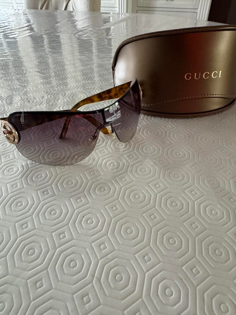 Gucci zonnebril, Ophalen of Verzenden, Zo goed als nieuw, Zonnebril