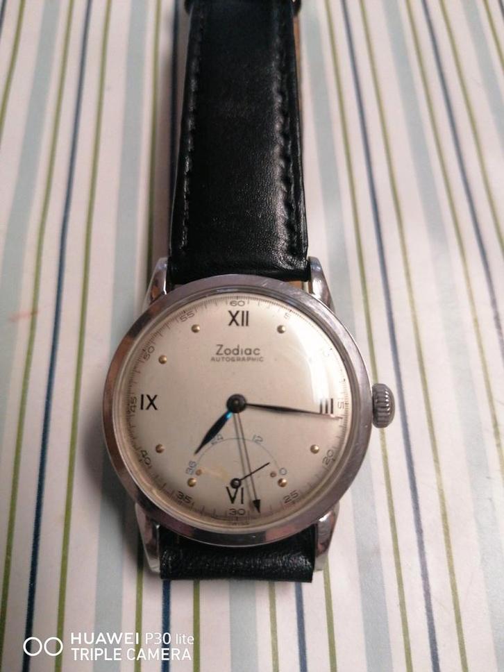 Zodiac horloge, Handtassen en Accessoires, Horloges | Antiek, Staal, Ophalen of Verzenden