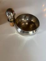 Verzilverde wijnstop, Enlèvement