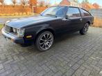 Toyota Celica TA 40 bouwjaar 1980, Auto's, Stof, 4 cilinders, Zwart, Handgeschakeld