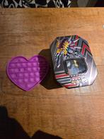 Pokemon kaarten en pop it, Enlèvement