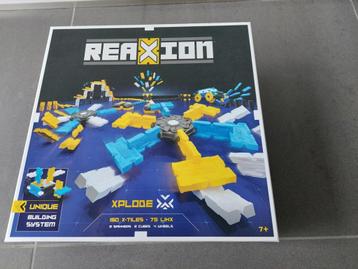 Reaxion domino systeem nieuw in originele verpakking
