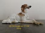 portseleinen beeld hond, Ophalen