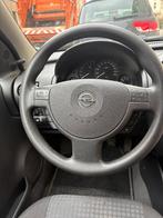 Opel Corsa 1.2 benzine 2004, Auto's, Opel, Stof, Euro 4, Zilver of Grijs, Corsa