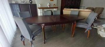 Ovalen eettafel gaaf tafelblad uitschuifbaar. Kerselaar beschikbaar voor biedingen