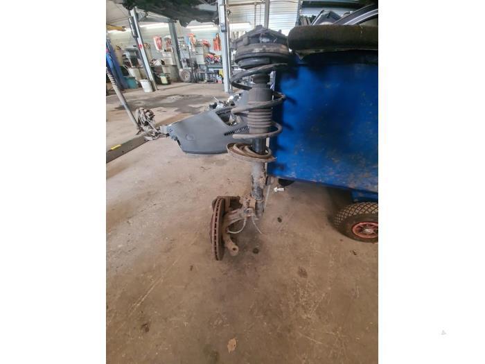 Schokdemper links-voor van een Renault Clio, Auto-onderdelen, Ophanging en Onderstel, Renault, Gebruikt, 3 maanden garantie, Ophalen of Verzenden