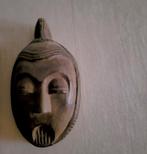 Tribaal masker, Ophalen