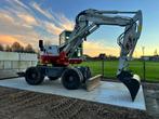 Takeuchi TB295W bandenkraan, Enlèvement, Excavatrice