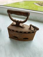 Antiek strijkijzer, Ophalen