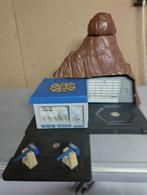 Masker van Lots (vintage), Ophalen