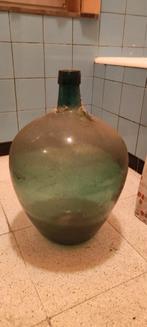 Dame jeanne fles in groen glas, Ophalen