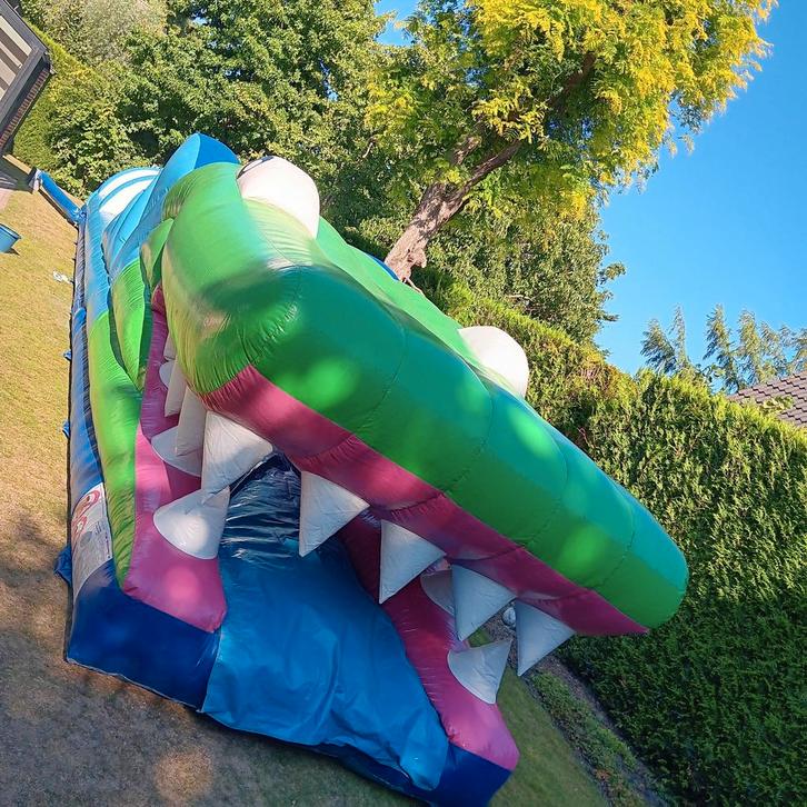 Springkussen buikschuifbaan te huur, Hobby en Vrije tijd, Feestartikelen | Verhuur, Ophalen of Verzenden