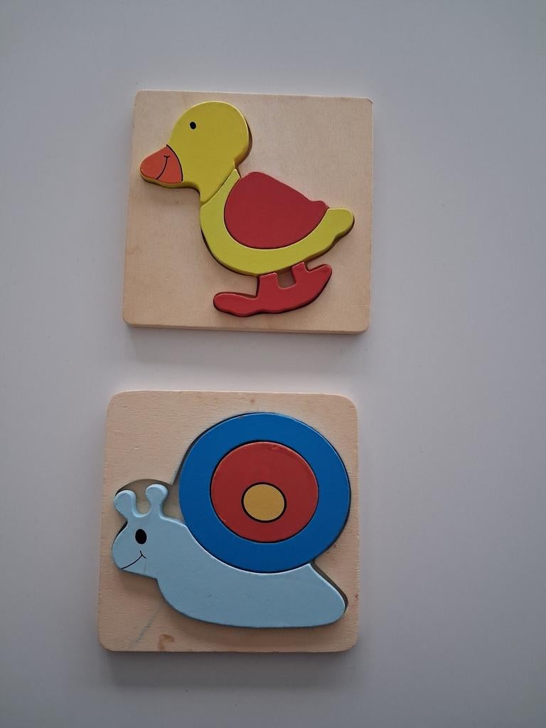 2 puzzels in hout, Ophalen