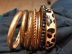 10 armbanden dames, Ophalen of Verzenden, Gebruikt, Goud, Staal
