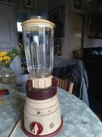 Een vintage elektrische mixer uit België, Ophalen