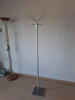 Moderne kapstok, Ophalen