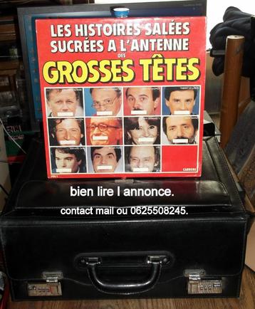 lot de 40 vinyles 33Tavec une mallette de transport. beschikbaar voor biedingen