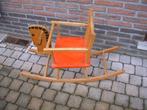houten schommelpaard, Ophalen