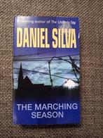 Daniel Silva - The marching season, Ophalen of Verzenden, Zo goed als nieuw