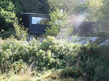 Maison de luxe avec sauna et vue imprenable. Les chiens sont