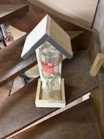 Voederhuisje, Ophalen