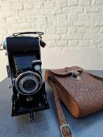 Fototoestel jaren 50, Ophalen