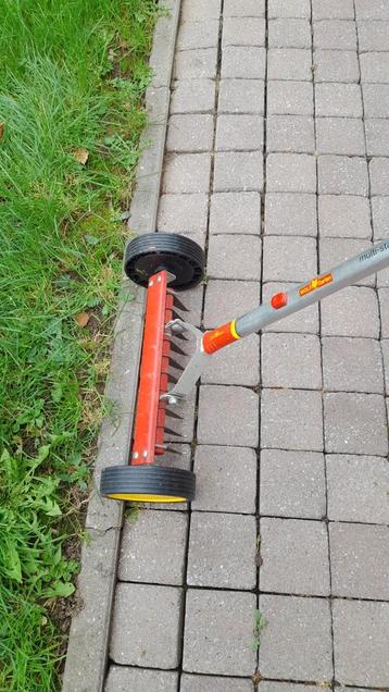 Scarificateur Wolf +manche Wolf de 1m40  beschikbaar voor biedingen