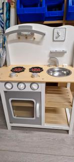 Speelgoed keuken, Ophalen