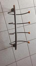 Porte-manteau mural, Ophalen