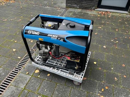 SDMO Diesel 6500 TE XL, Doe-het-zelf en Bouw, Aggregaten, Zo goed als nieuw, Dieselolie, 5 tot 10 kVA, Elektrisch startend, Ophalen