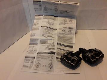 1 nieuwe Shimano en 2 gebruikte klikpedalen beschikbaar voor biedingen