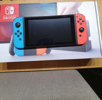 Nintendo switch console blauw/rood + 4 spelletjes beschikbaar voor biedingen
