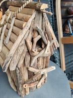 Vogel hok uit drijfhout, Ophalen