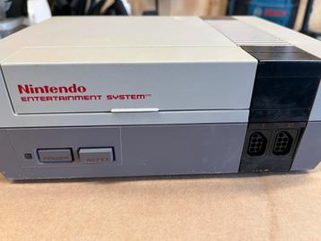 Nintendo NES met 2 controllers en Super Mario Bros 3 beschikbaar voor biedingen