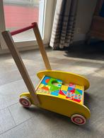 Loopwagen met bouwblokken, Ophalen