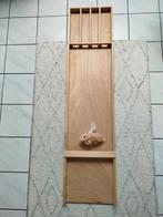 Houten sjoelbak met jetons, Ophalen