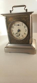 oude wekker, Enlèvement