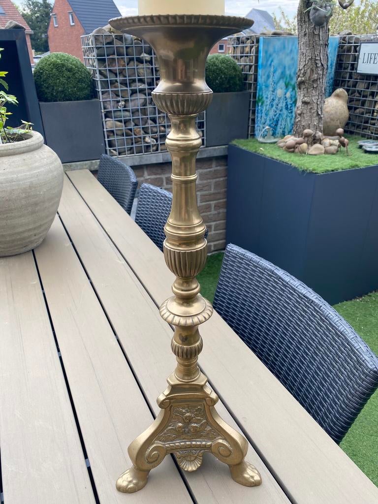 Koperen kandelaar met kaars, Ophalen