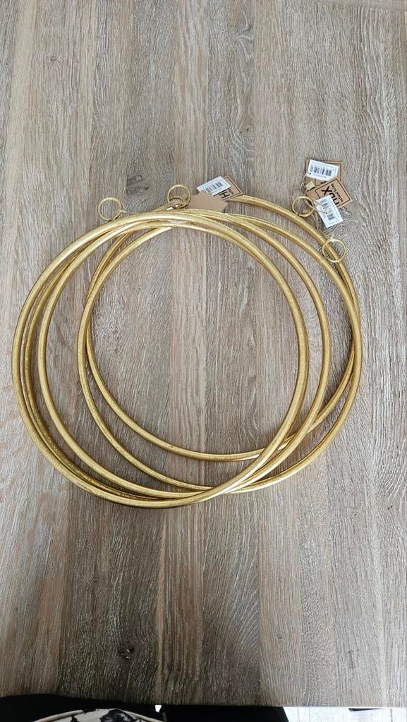 5 decoratie ringen goud, Ophalen