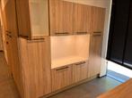 Bureau met stockage kasten, Ophalen