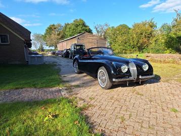 Jaguar XK120 DHC cabrio (1953) zwart rood leder nieuwstaat! beschikbaar voor biedingen