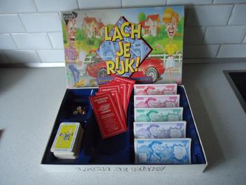 Vintage "Lach Je Rijk"van Parker als Nieuw !! beschikbaar voor biedingen