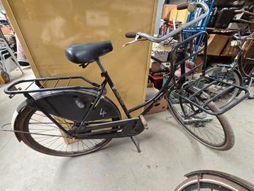 Retro fiets Gouden leeuw met bagagedrager vooraan, Fietsen en Brommers, Fietsen | Oldtimers, Ophalen of Verzenden