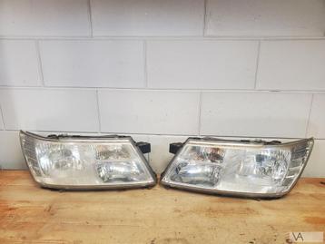 Dodge Journey / Fiat Freemont koplamp links en rechts €100st beschikbaar voor biedingen