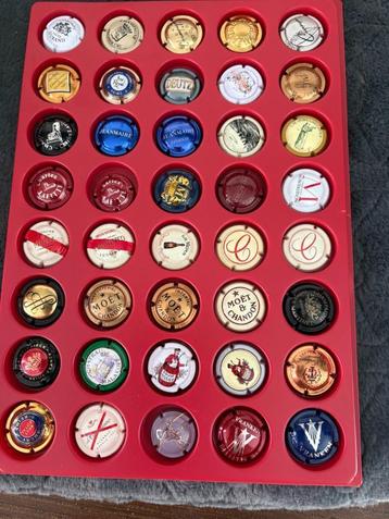 40-tal champagnecapsules beschikbaar voor biedingen