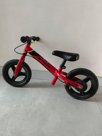 Rode loopfiets Btwin beschikbaar voor biedingen