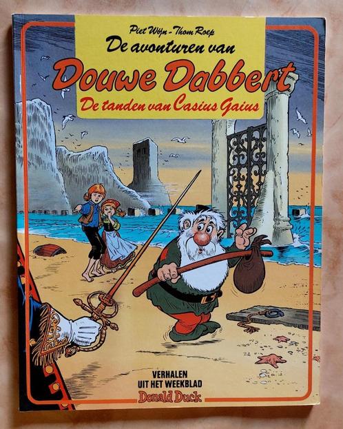 Strip - Douwe Dabbert - De tanden van Casius Gaius, Boeken, Stripverhalen, Zo goed als nieuw, Eén stripboek, Ophalen of Verzenden