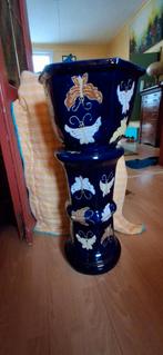 Piedestal met vlinders, Ophalen