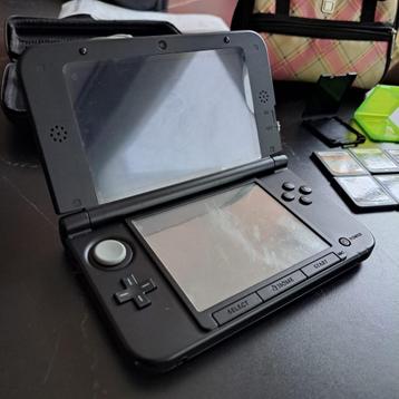 Nintendo 3DS XL + accessoires + pokemon crystal beschikbaar voor biedingen